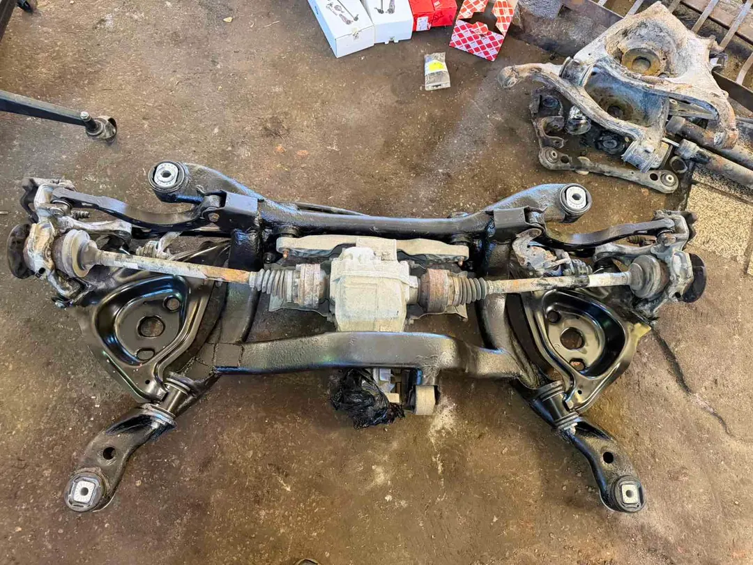 Control Arm, Shock Absorber, and Bushing Replacement — Audi A6 C6 — 2