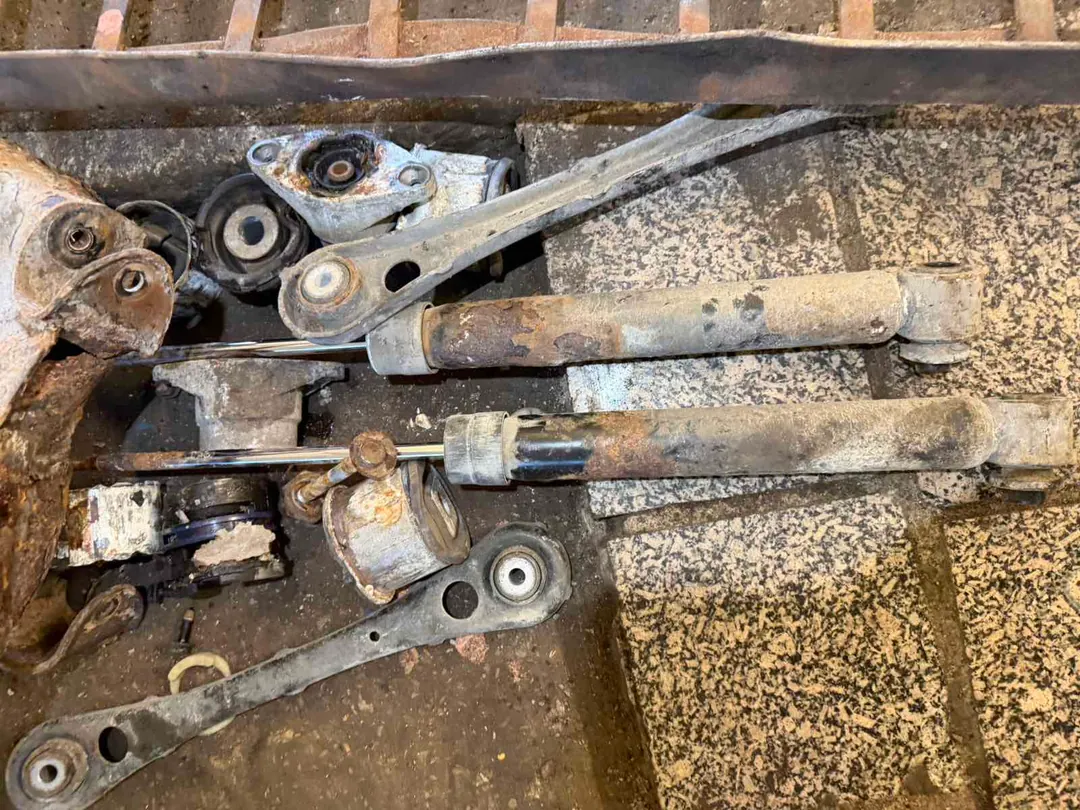 Control Arm, Shock Absorber, and Bushing Replacement — Audi A6 C6 — 4